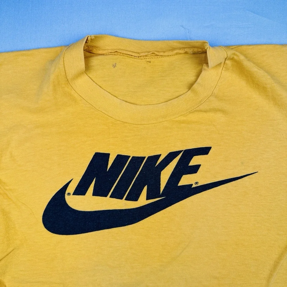 Vintage 80s Nike Logo T-Shirt Yellow Single Stitch Made in USA Size S